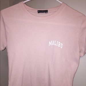 Pink “malibu” t-shirt from Brandy Melville